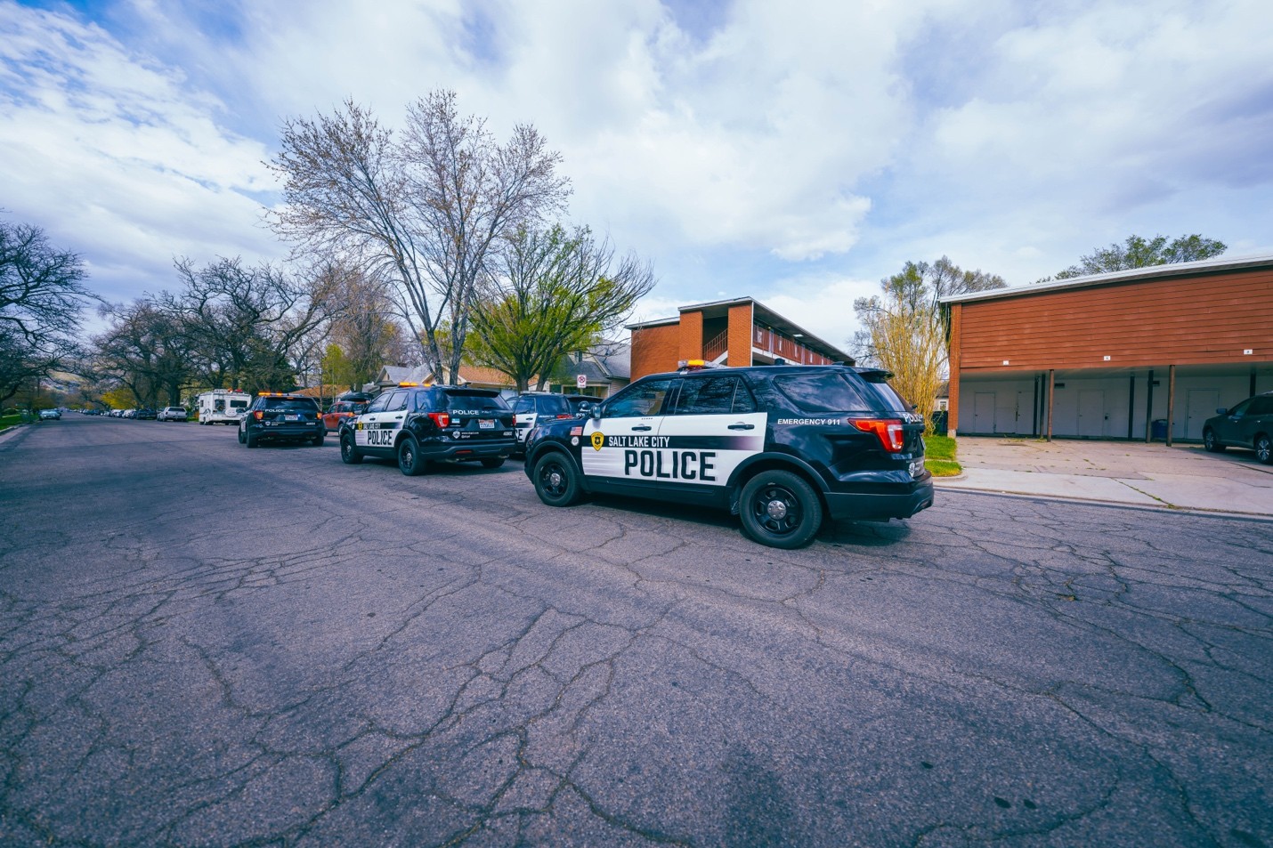 Marked police cars with Salt Lake City parked on 200 East following a shooting near Kensington Avenue (Courtesy SLCPD)